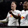 Bundesliga: Leipzig Goleia Hoffenheim em Duelo Crucial pela Liga dos Campeões